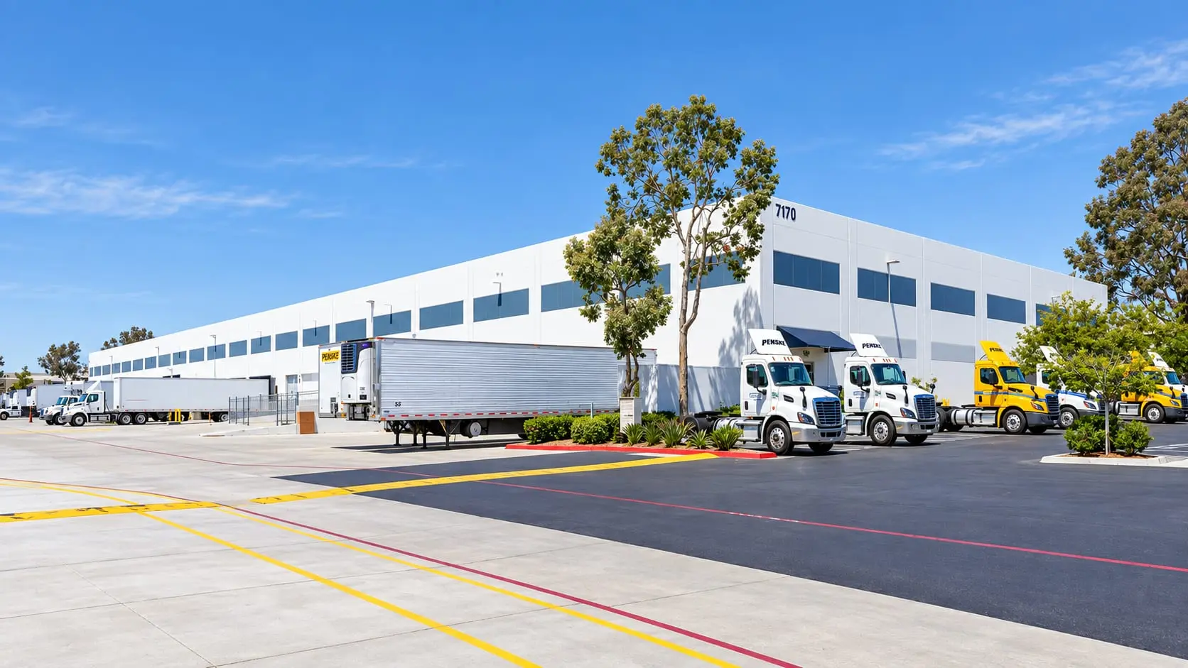Trucks at the loading docks of the Penske logistics facility in San Diego, California